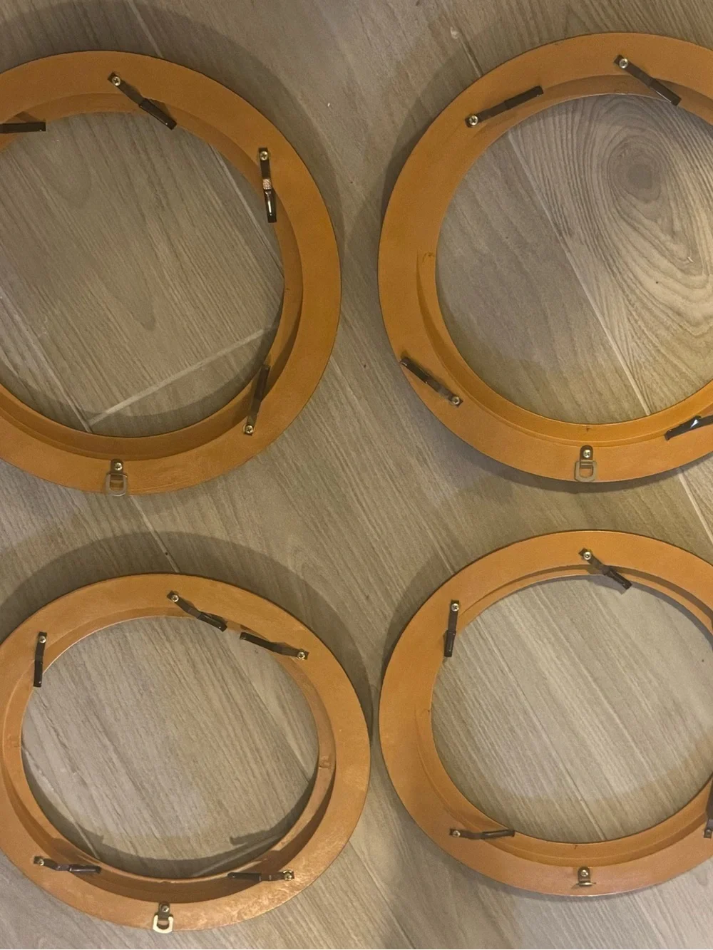 One set of 4 Round wall plate frames